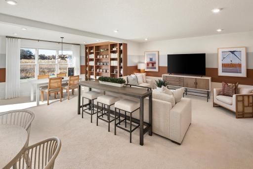 Room to spread out and settle in, this lower level is set up for relaxing, hosting, and making the most of your space *photo of model home (design options may vary)