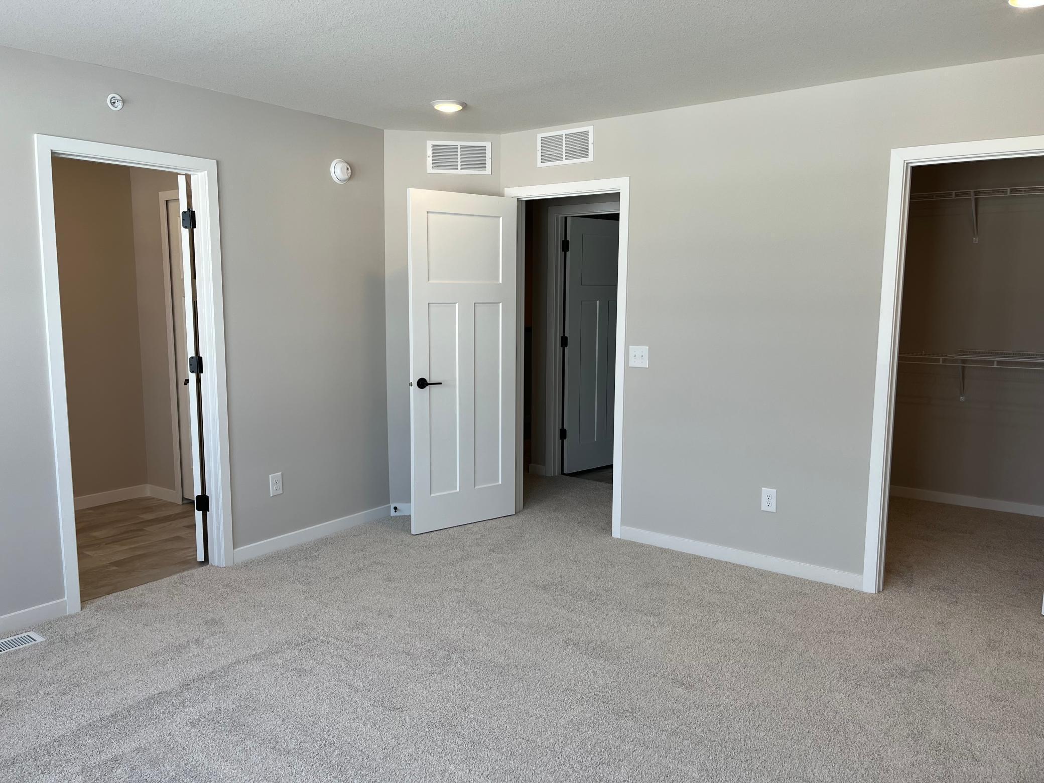 Primary bedroom with natural light