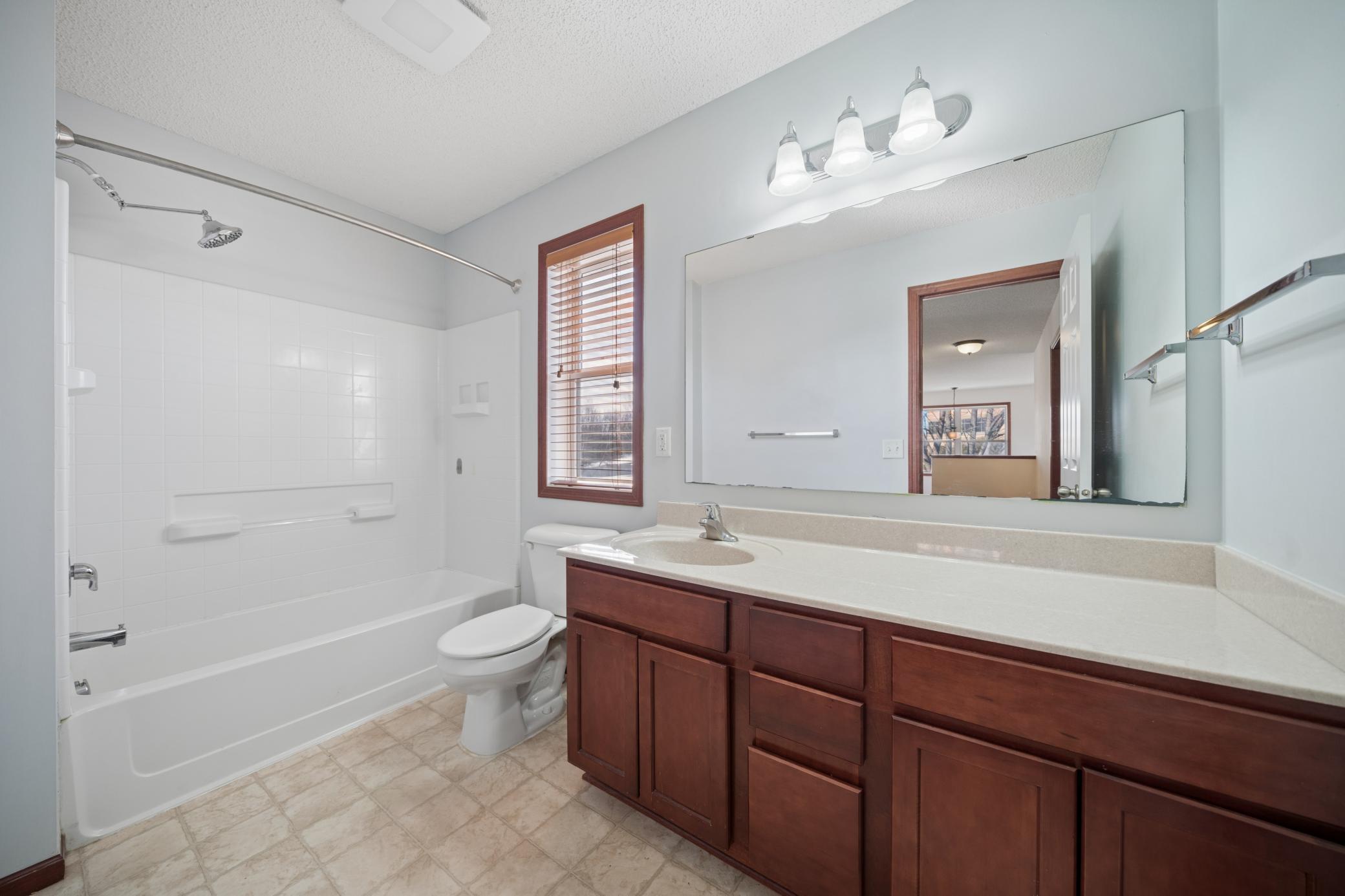 Upper level full hallway bathroom