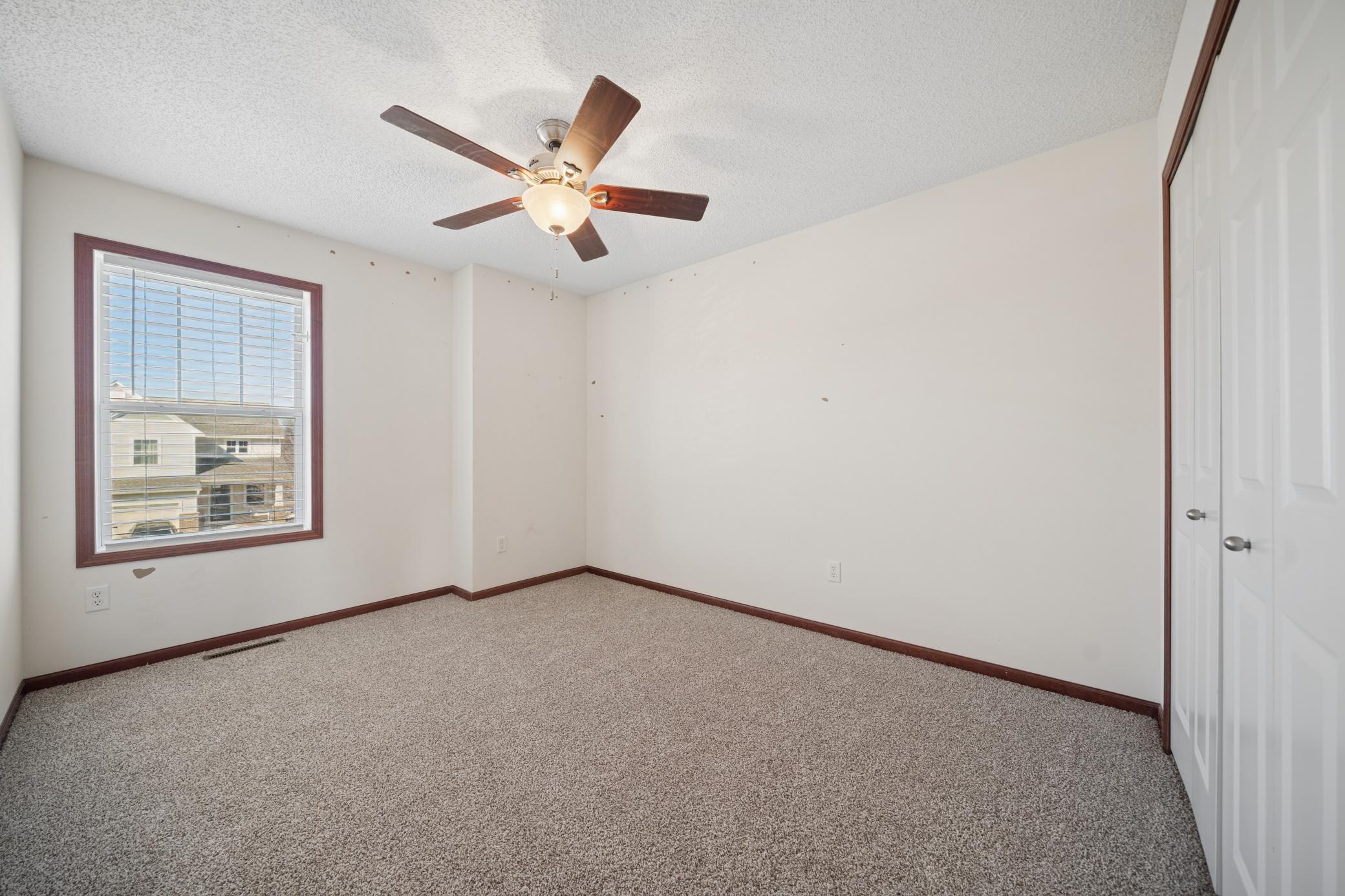 3rd of the 4 bedrooms on the upstairs level