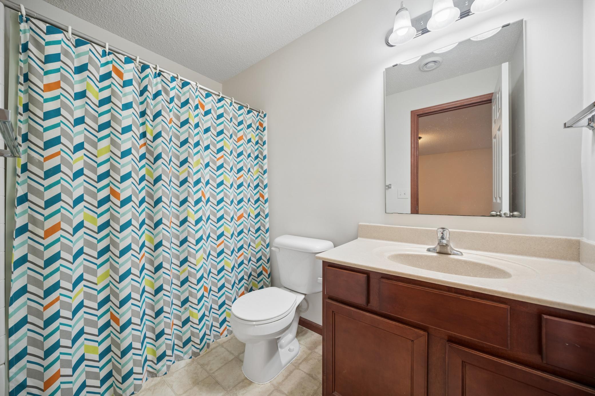 Full bathroom located on the lower level