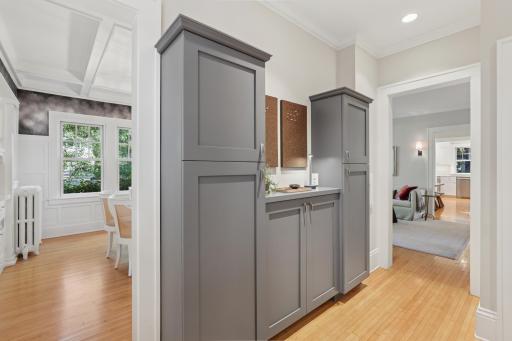 Come in from the backdoor and stay organized with this convenient built-in storage area for phone chargers, keys.