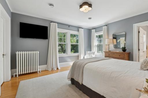 Primary bedroom gets lots of natural sunlight, enjoy this retreat from the hustle & bustle in your own luxury oasis.