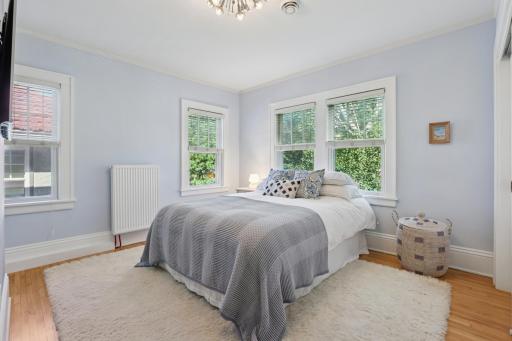 Guest bedroom on upper level. All the closets in this house have closet organizer systems installed.