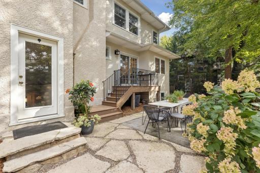 Backdoor leads to the mudroom, terrace and patio doors to kitchen visible in the background.
