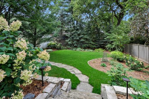 Outstanding backyard view from the patio - be prepared for guests to have "yard envy" of this flat, treed double lot.