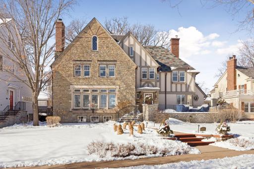 Bright morning light welcomes you to this east-facing gem on West Lake of the Isles Parkway