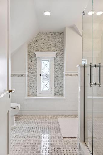 Convenient en suite bath serving the third-floor suite