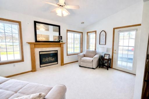 Enjoy your morning coffee in the sunroom with easy access to the patio