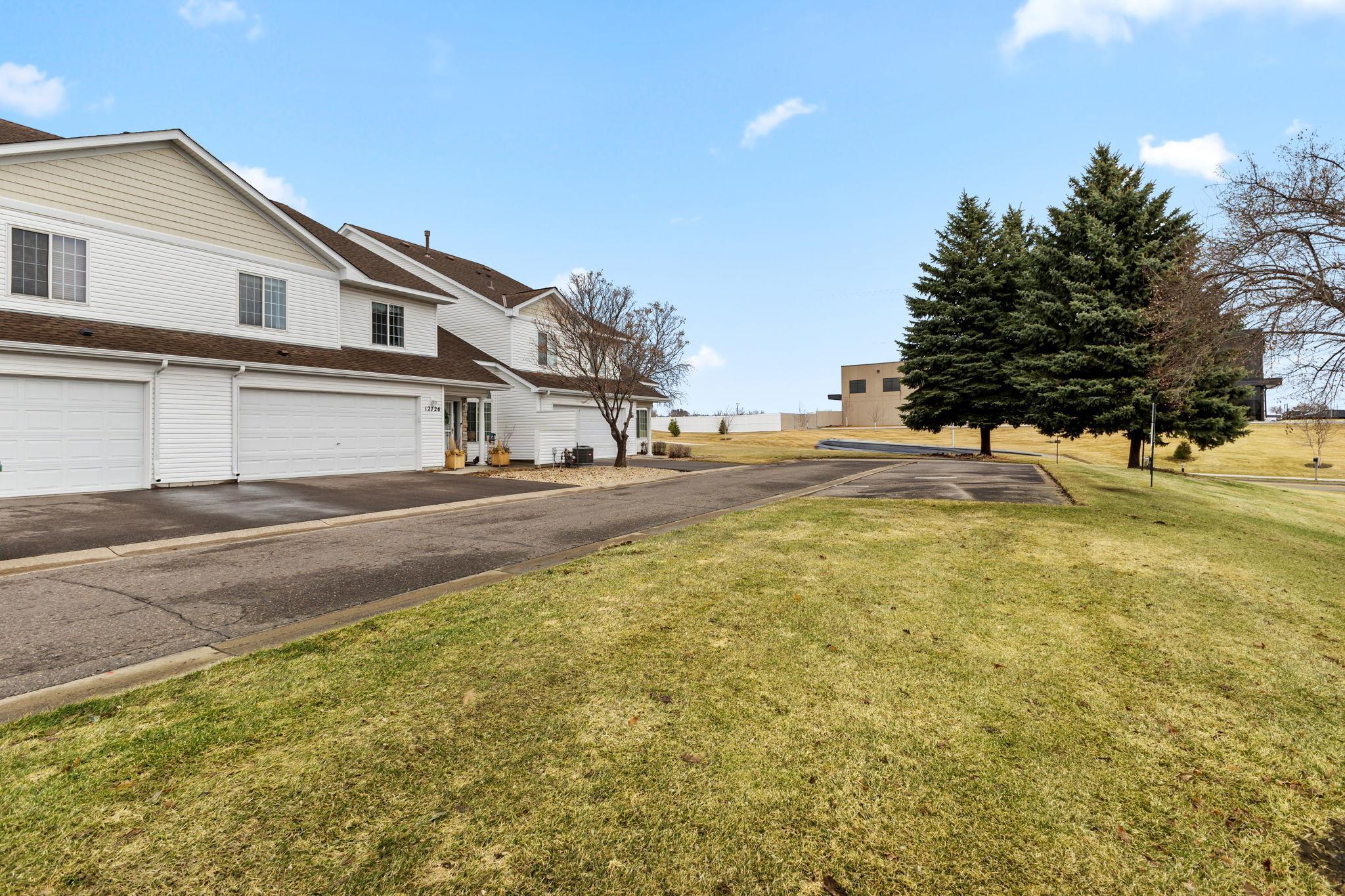 Located at corner of the development, you'll experience limited traffic, and enjoy guest parking right in front of your unit!