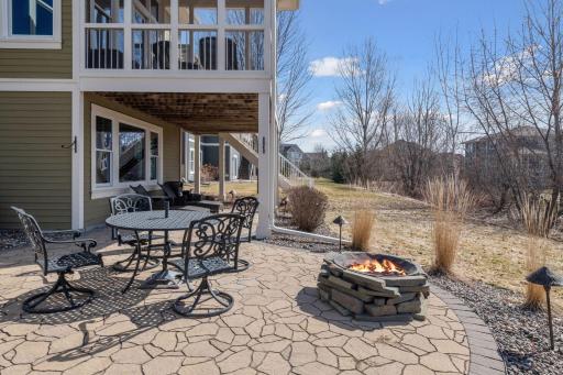 Private back patio with fireplace yet lots of play area too