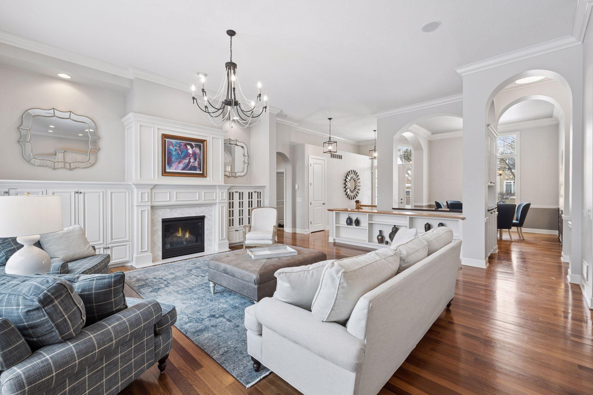 Living room with views into formal dining space