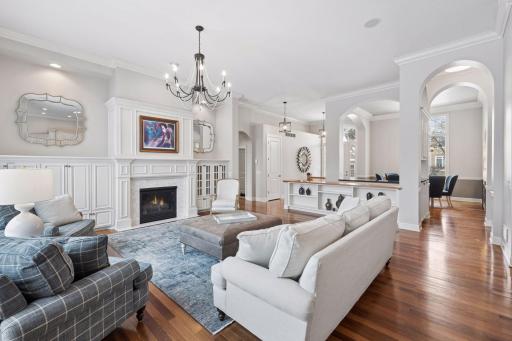 Living room with views into formal dining space