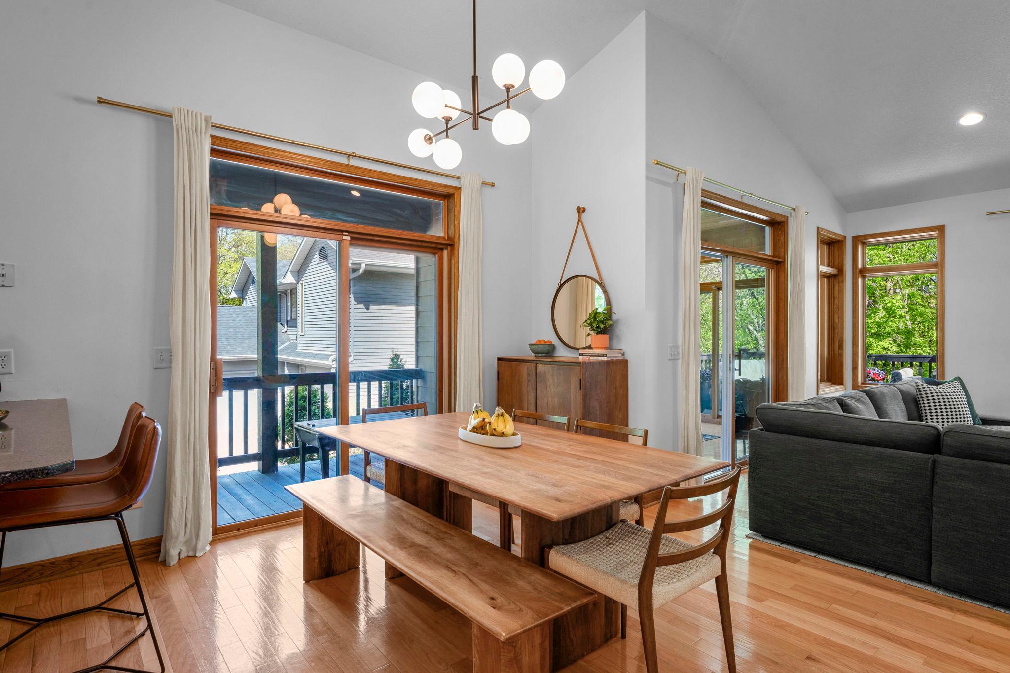 Dining area opens to living and kitchen spaces for flexibility. A side porch ads more outdoor possibilities, for a morning coffee, perhaps?
