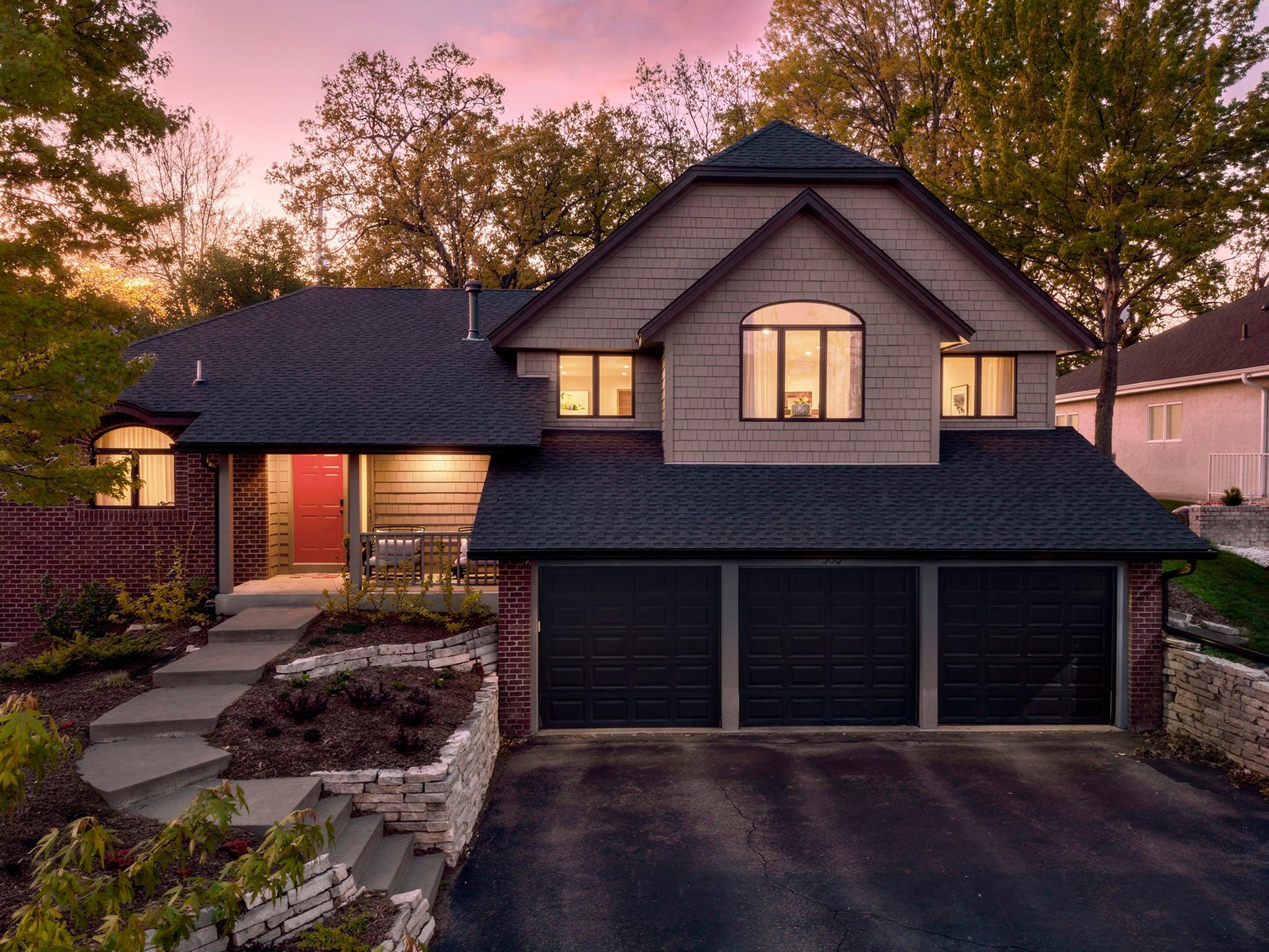 Welcome to 300 Dearborn Ct Edina. Tucked away on a quiet double cul-de-sac on a wooded lot.