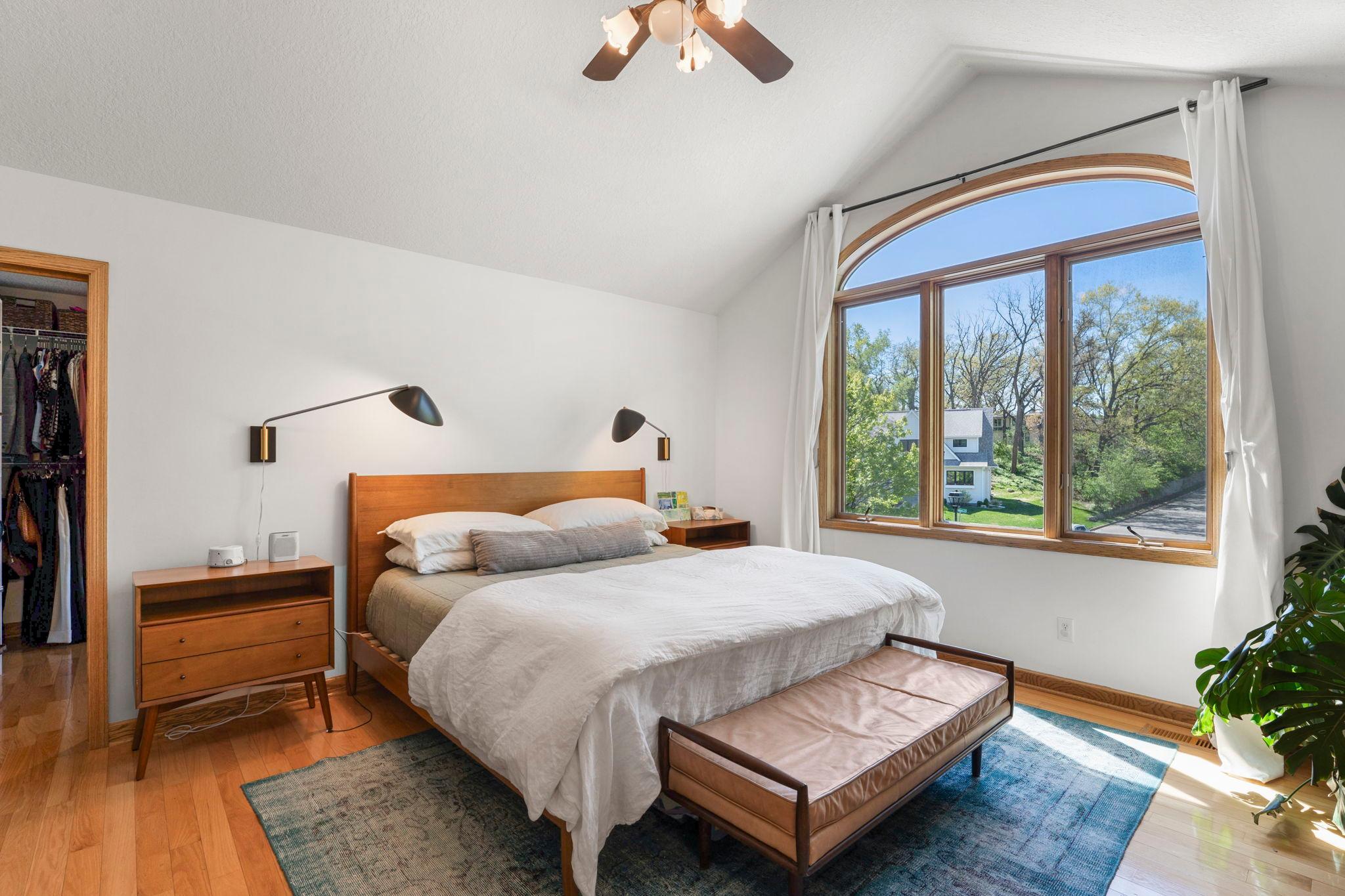 Primary suite has vaulted ceilings and tons of light!