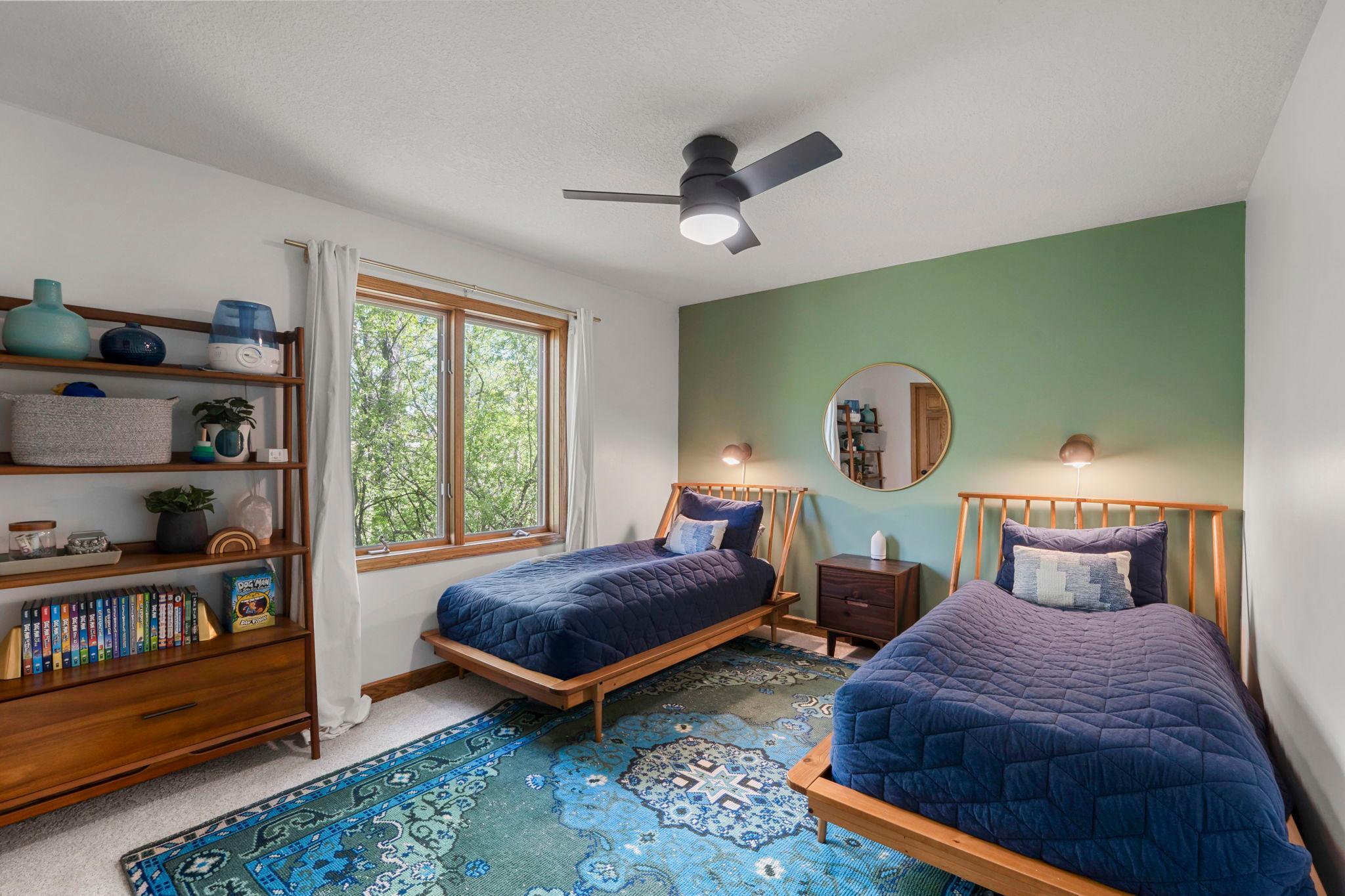 1 of 3 bedrooms up is like being in a treehouse with the woods right outside