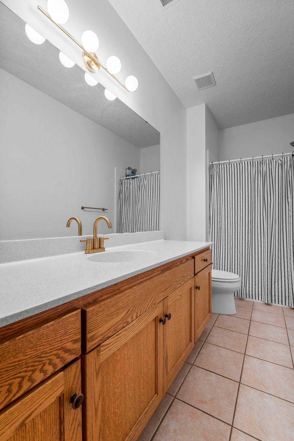 Full bath next to the fourth BR