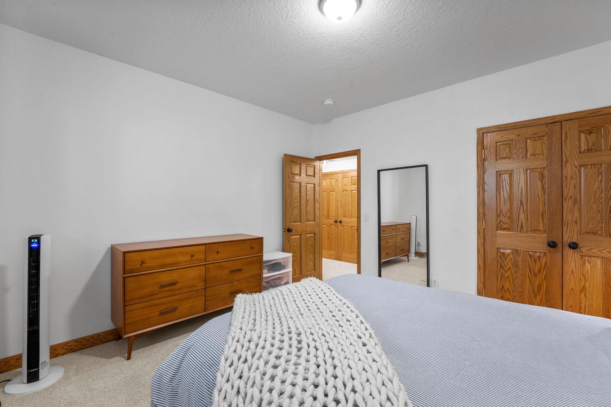 4th BR on first level down has a spacious closet with double doors