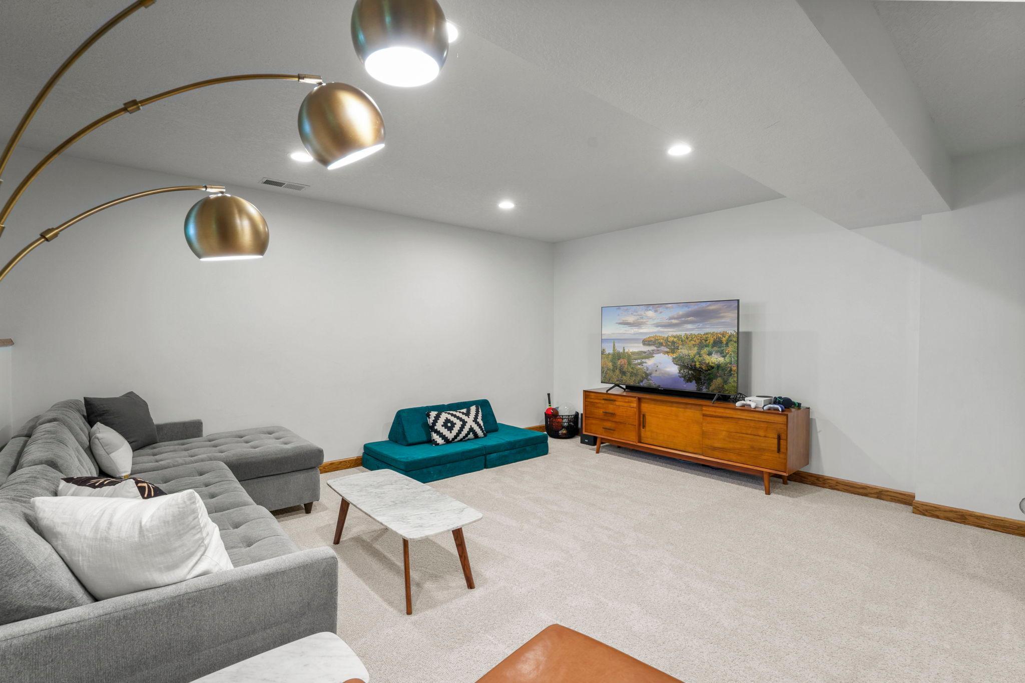 New carpet in the family room and recessed lighting