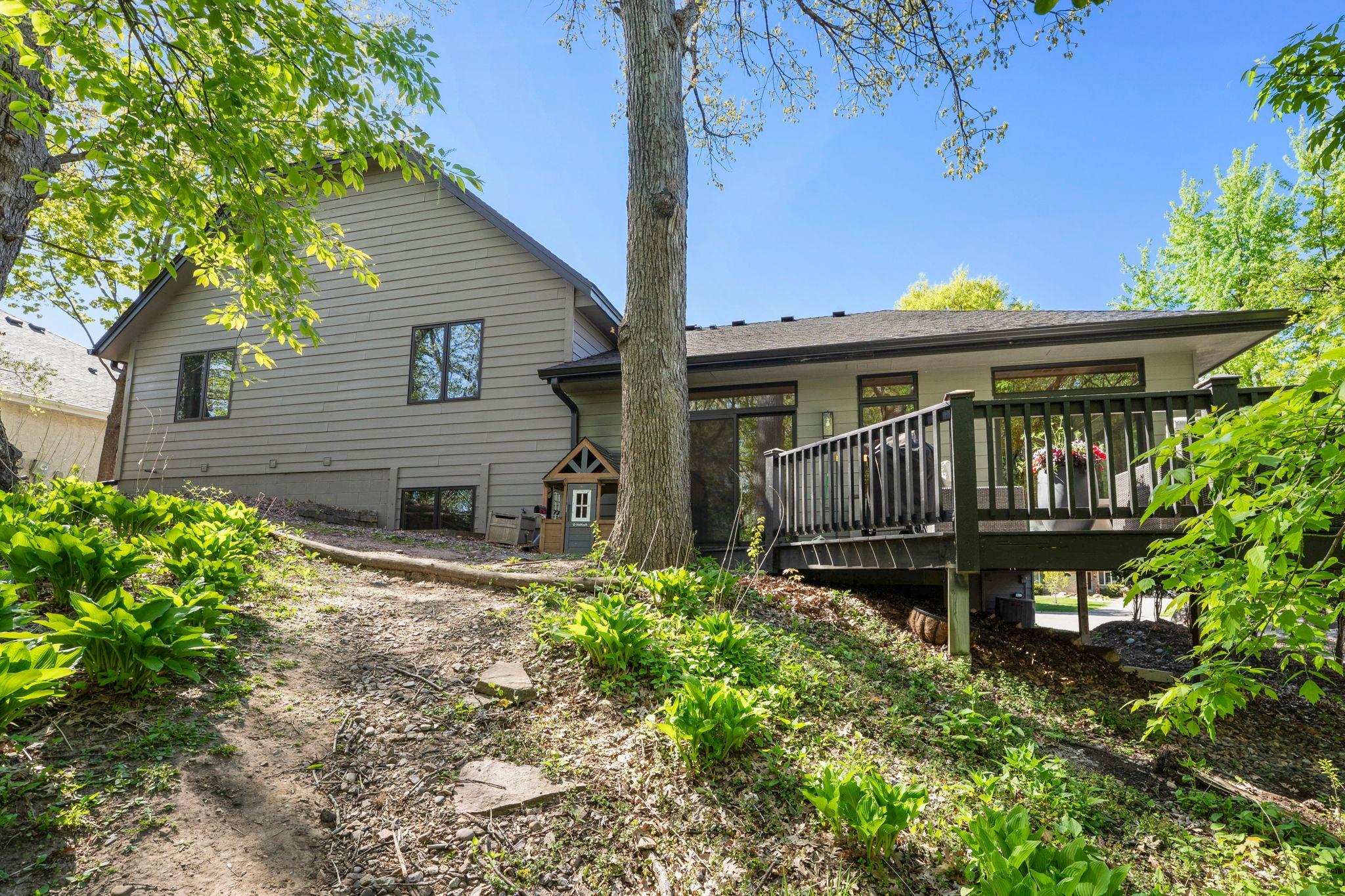 Home backs up to a trail and walking paths, and the Blake school just beyond.
