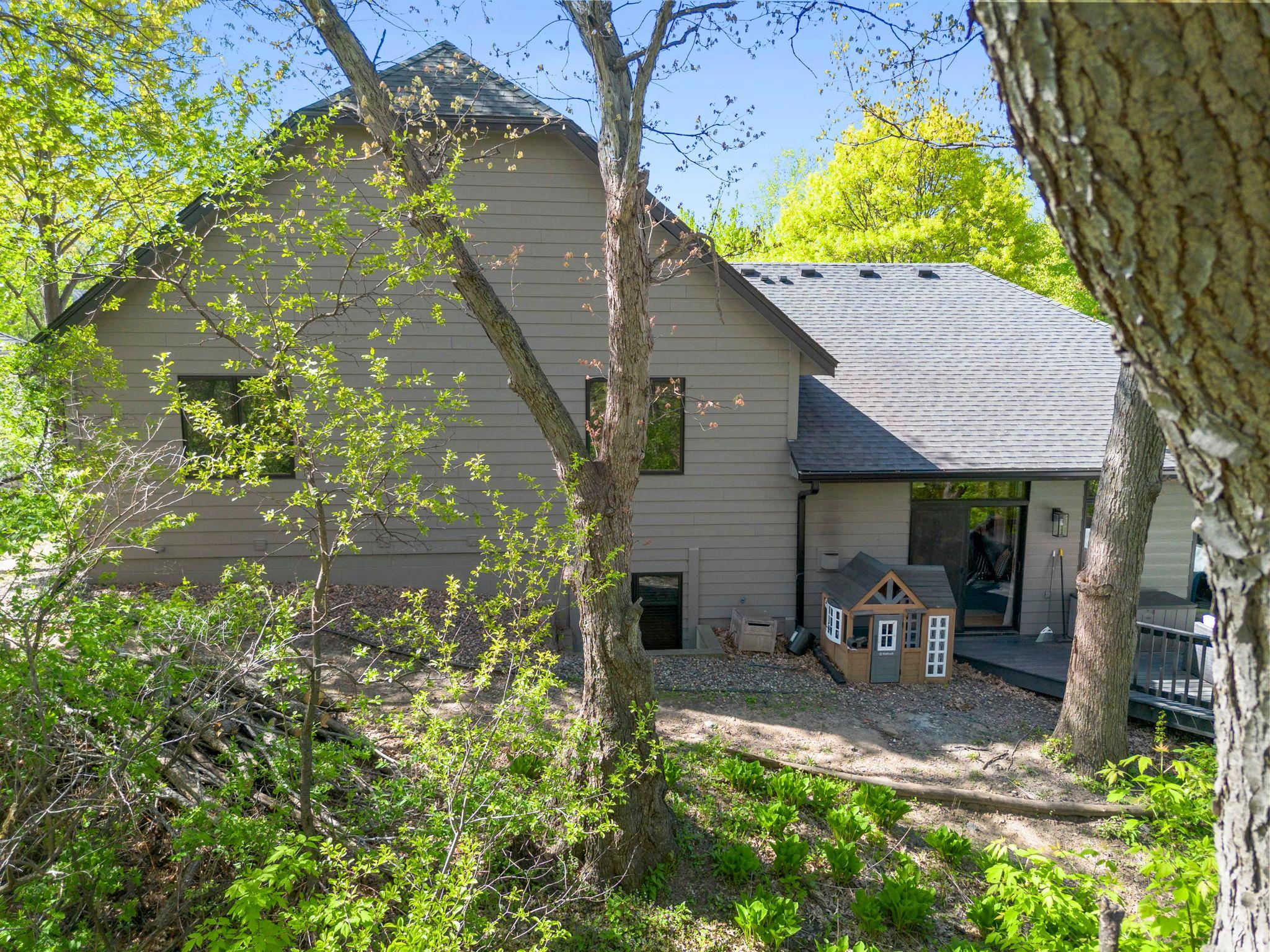Home backs up to a trail and walking paths, and the Blake school just beyond.