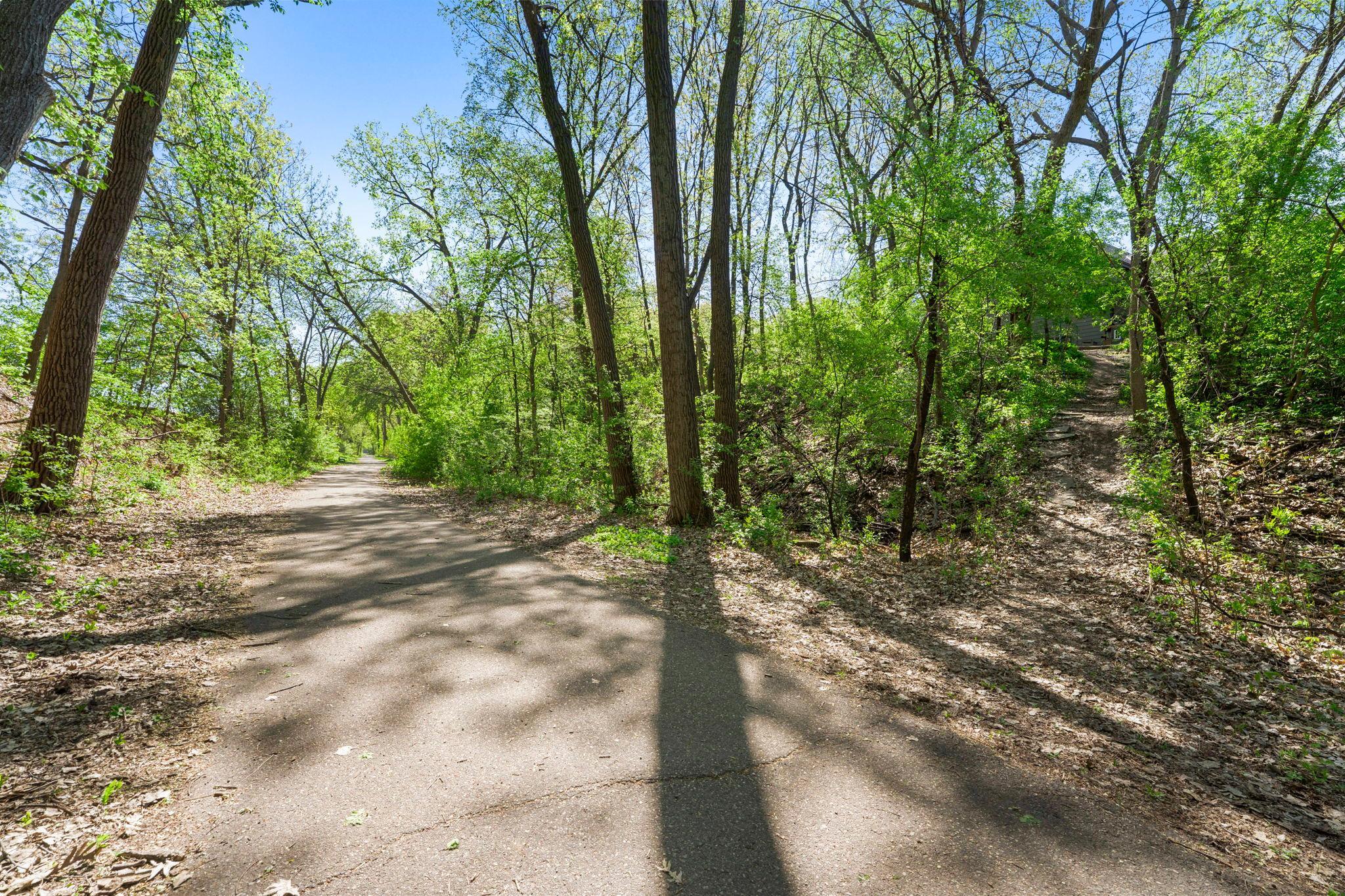 Home backs up to a trail and walking paths, and the Blake school just beyond.