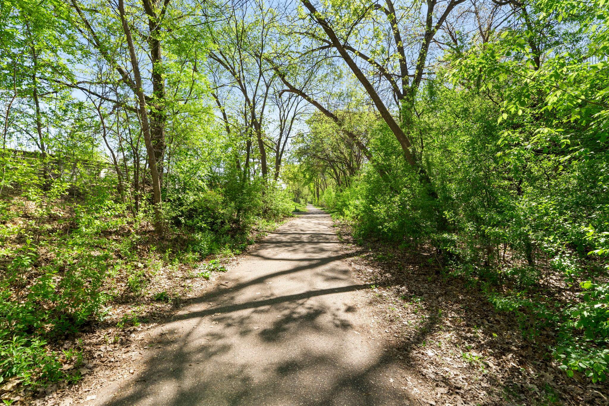 Home backs up to a trail and walking paths, and the Blake school just beyond.