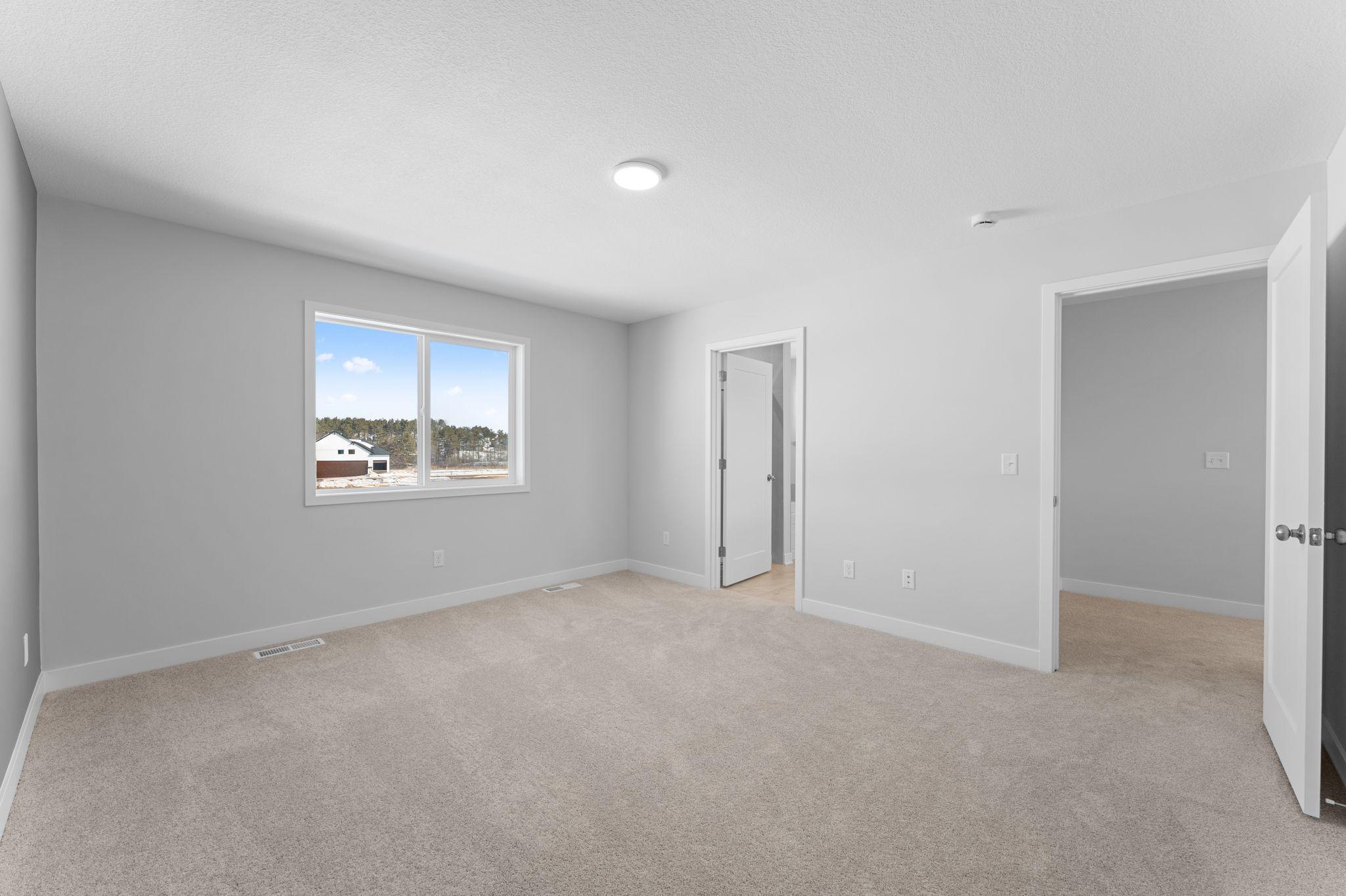 Owner's Suite with 2 Walk-In Closets