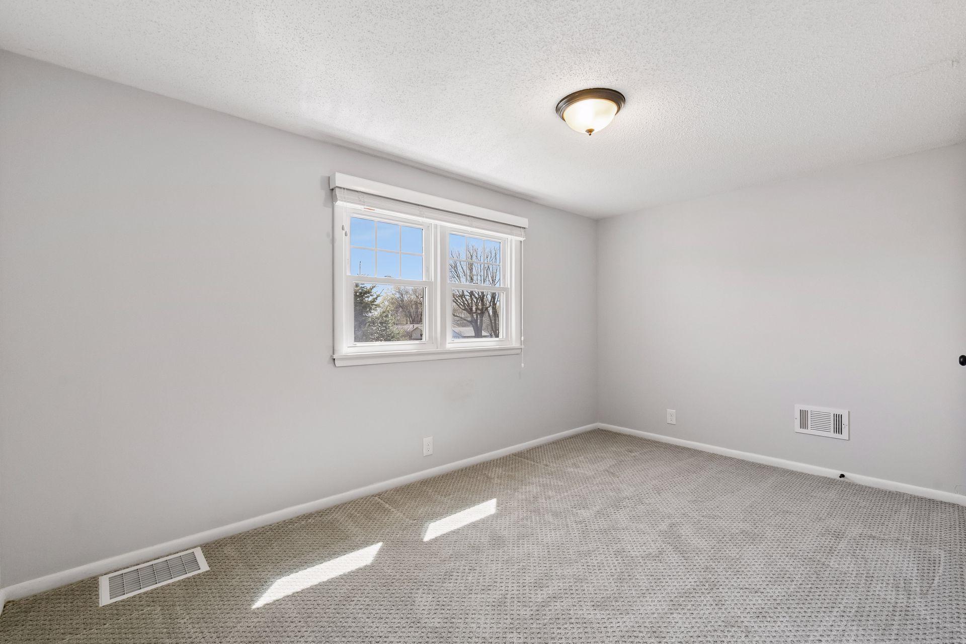 Upper level bedroom with fresh updates