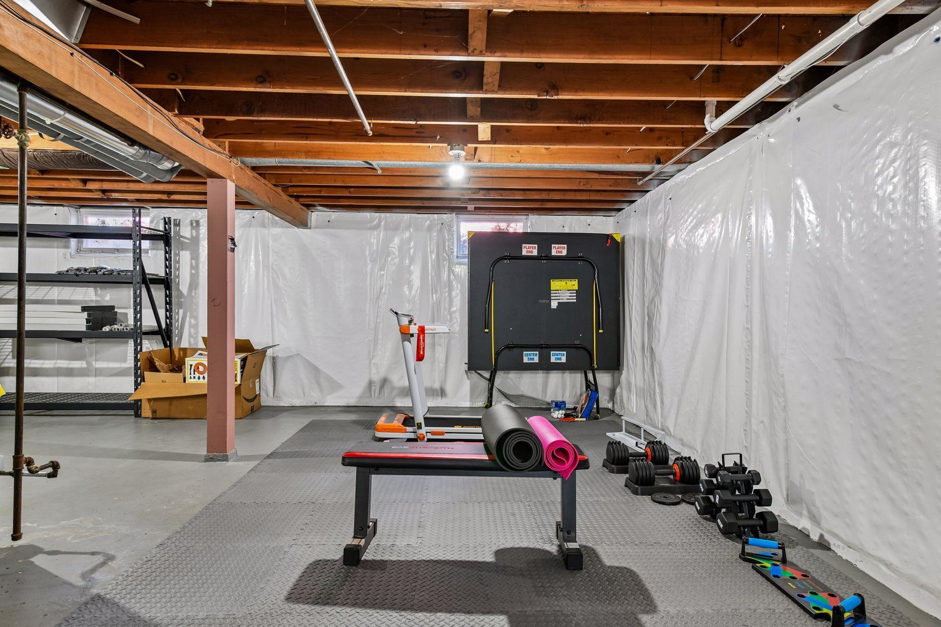 Workout space, laundry & loads of storage in the lower level