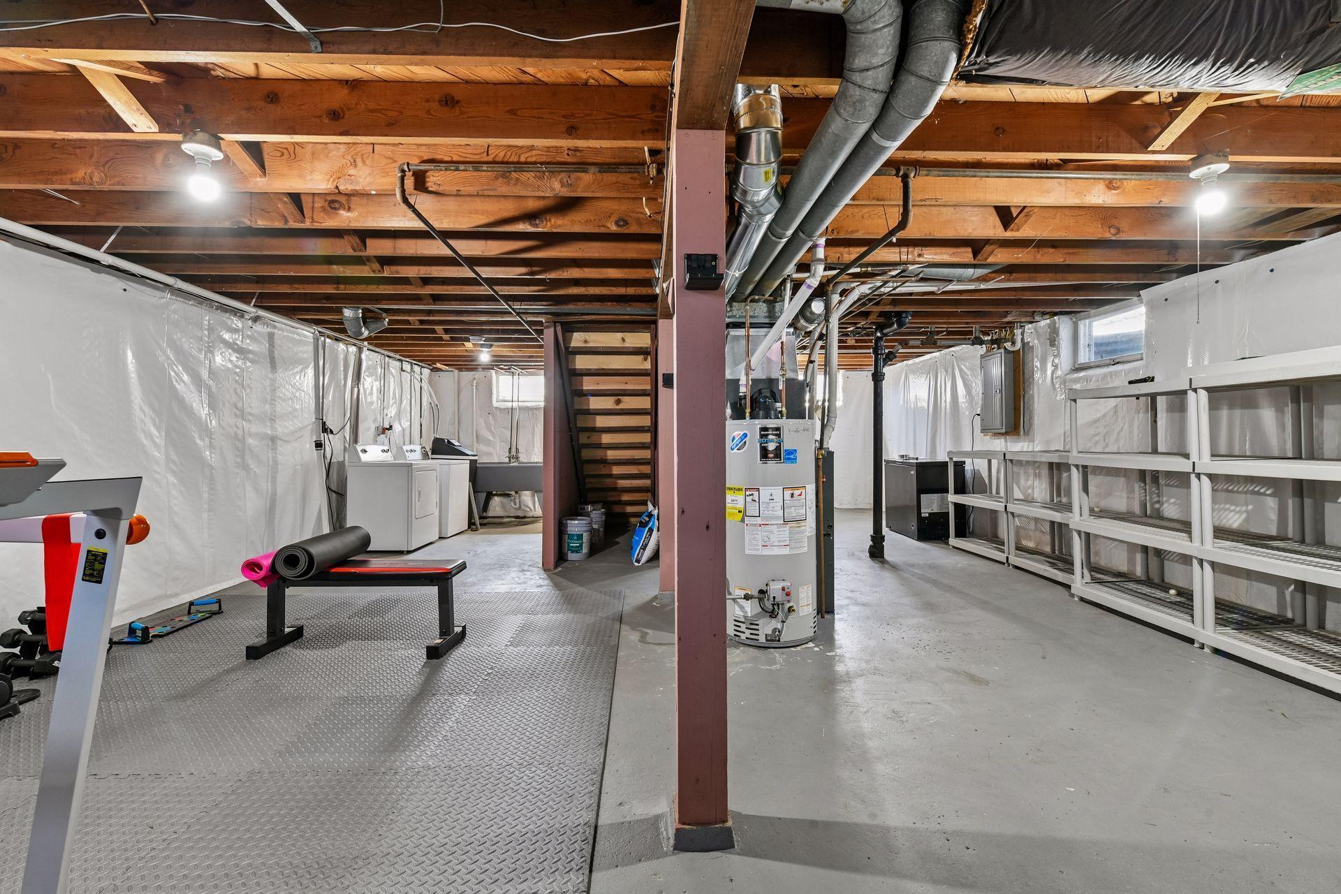 Laundry & sink on the lower level. Potential to add finished space & build equity down here.