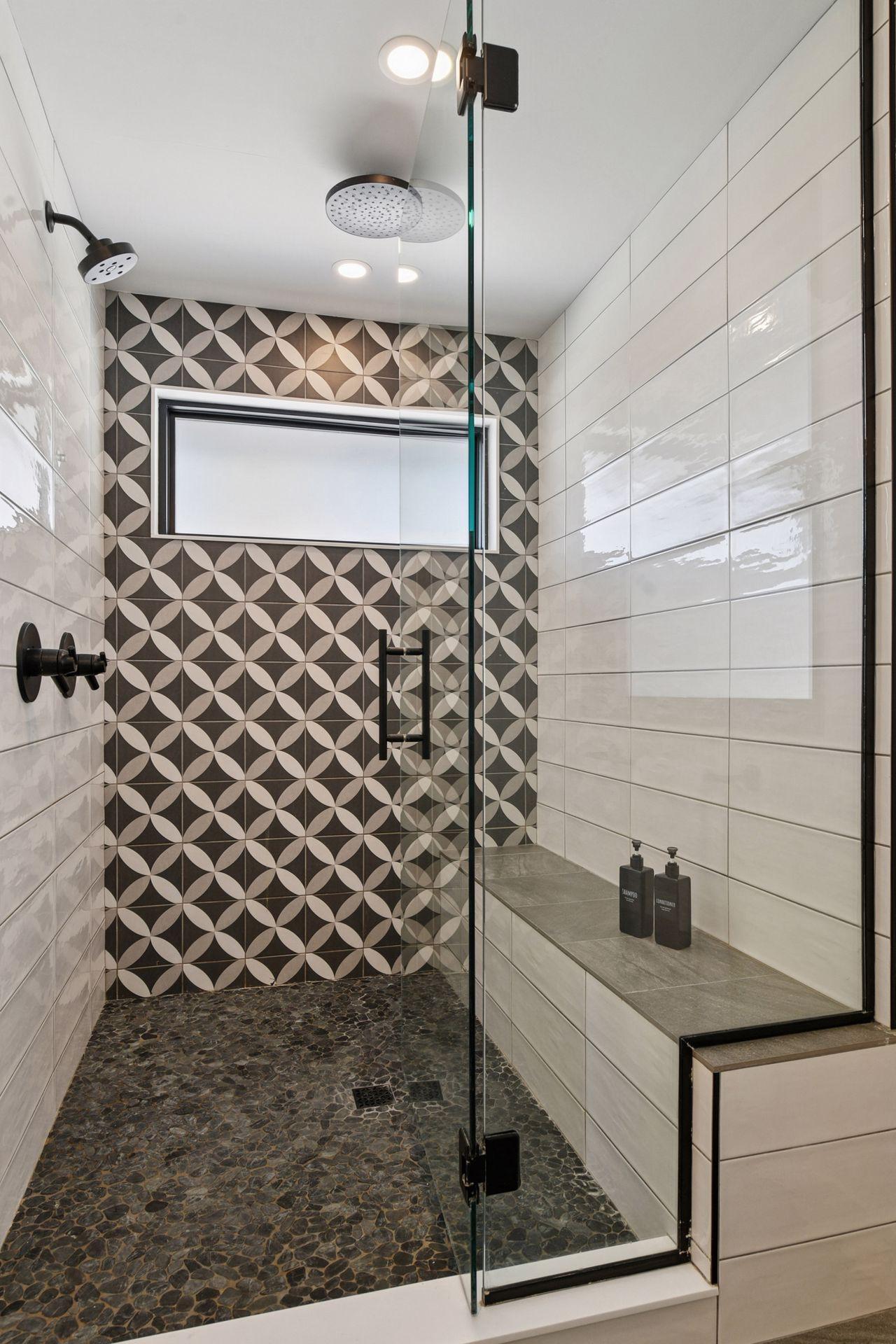 Large walk in shower with bench
