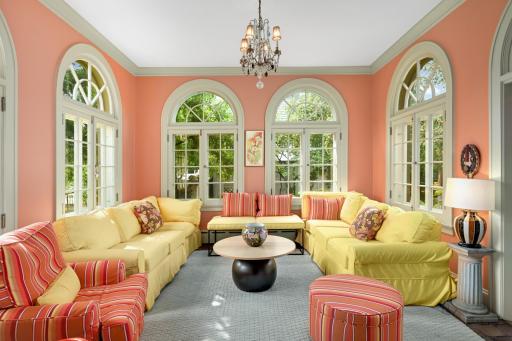 Sunroom off of the kitchen and living room overlooks the terrace.