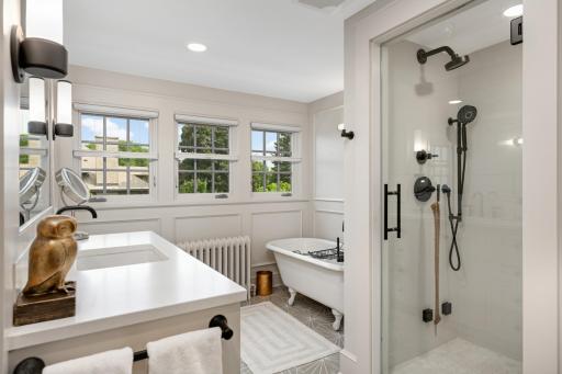 3rd floor bathroom with steam shower and heated floors.