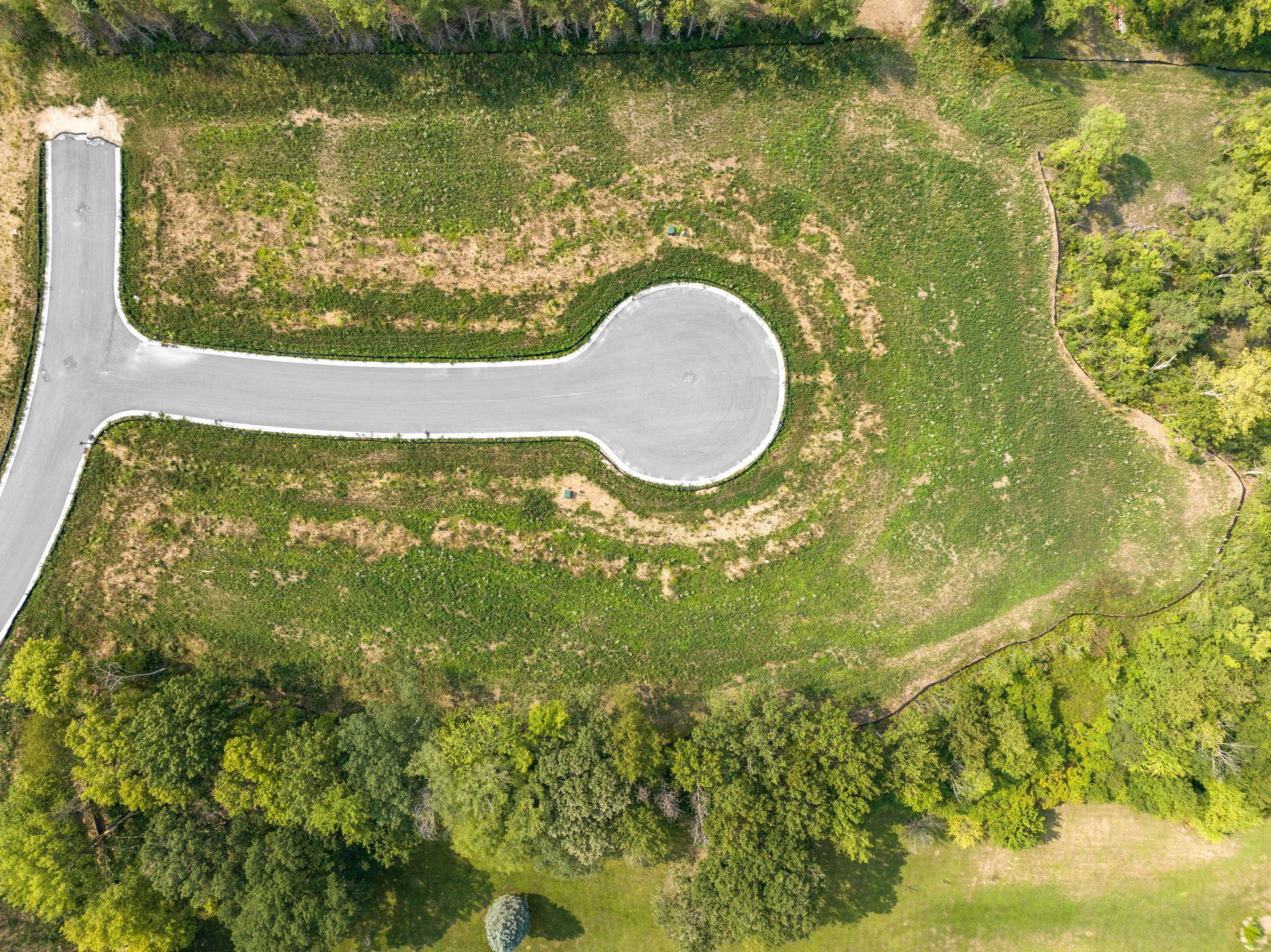 Tucked into a quiet cul-de-sac in Doolin Heights, this homesite offers privacy with minimal through traffic — ideal for custom builds with a peaceful neighborhood feel..jpg