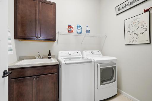 Main Floor Laundry w/Built-in Cabinets & Sink