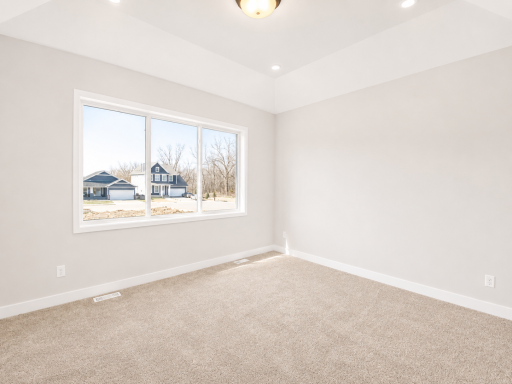 Private owner's suite featuring a spacious layout, large picture window, and plenty of room for a king-sized furniture arrangement.