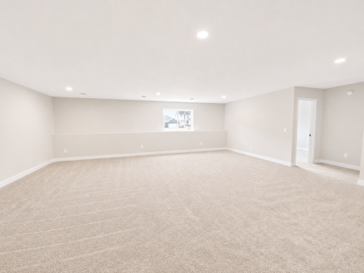 Expansive finished lower-level recreation room offers exceptional flexibility for entertaining, movie nights, a game room, or additional family living space.