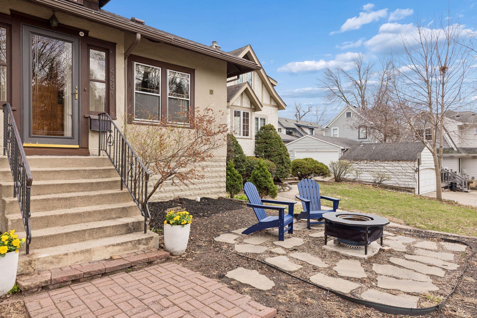 Inviting fieldstone front patio
