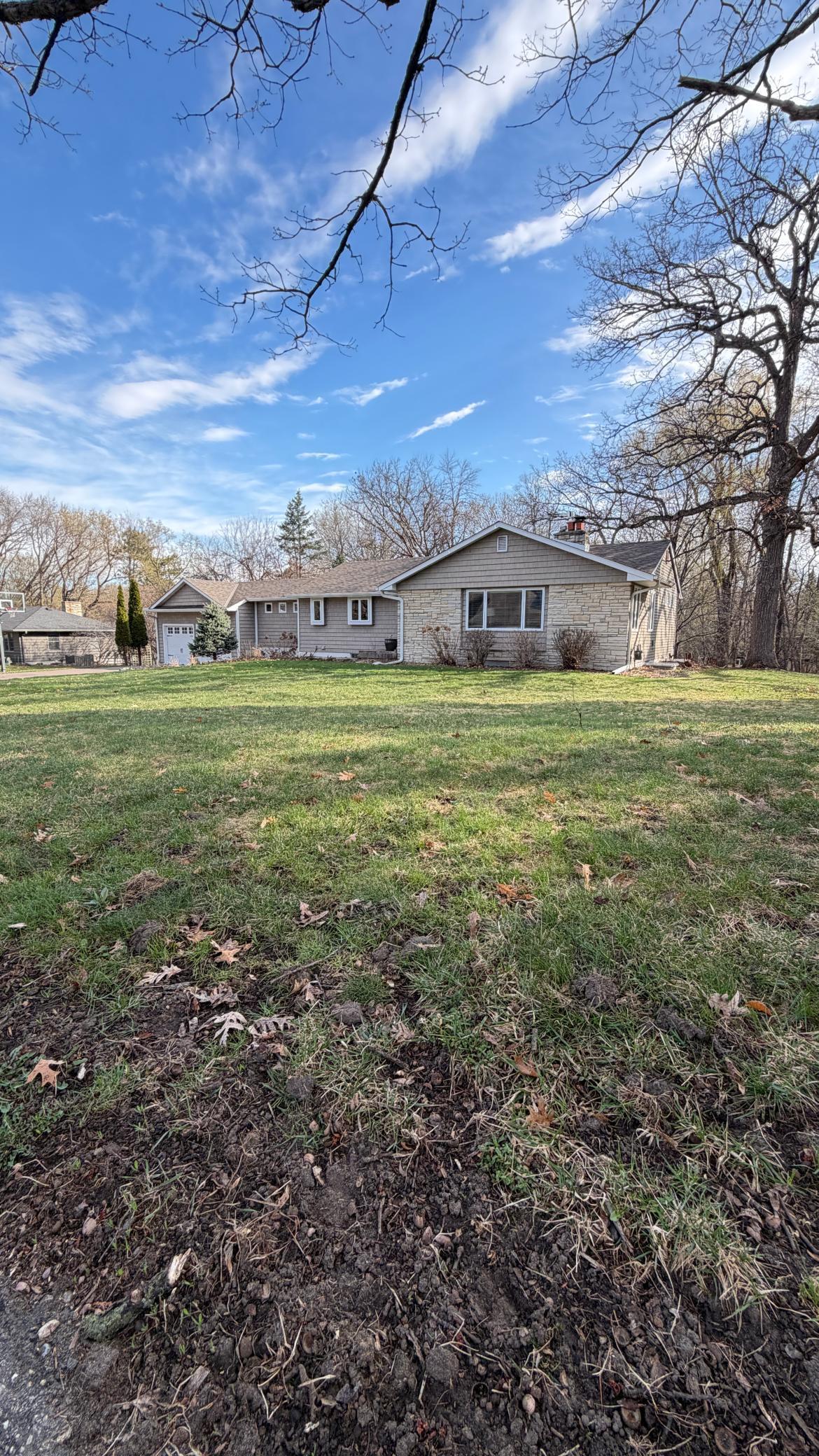 This isn't your average 4-bedroom home (2 main, 2 lower) layout and a private primary ensuite; it offers the perfect balance of privacy & connection. Step out from the lower-level walk-out directly into your own half-acre wooded sanctuary.