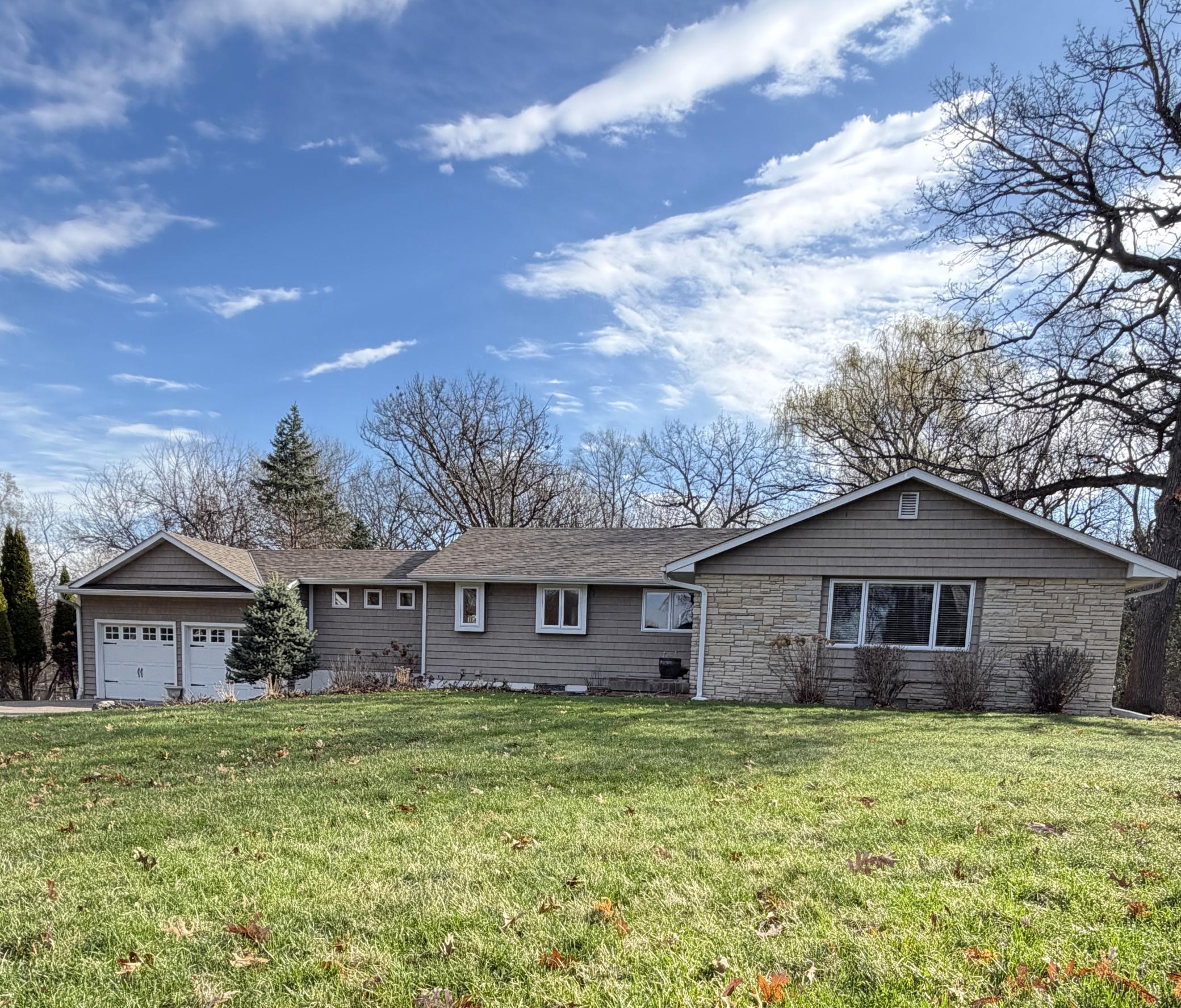This isn't your average 4-bedroom home (2 main, 2 lower) layout and a private primary ensuite; it offers the perfect balance of privacy & connection. Step out from the lower-level walk-out directly into your own half-acre wooded sanctuary.