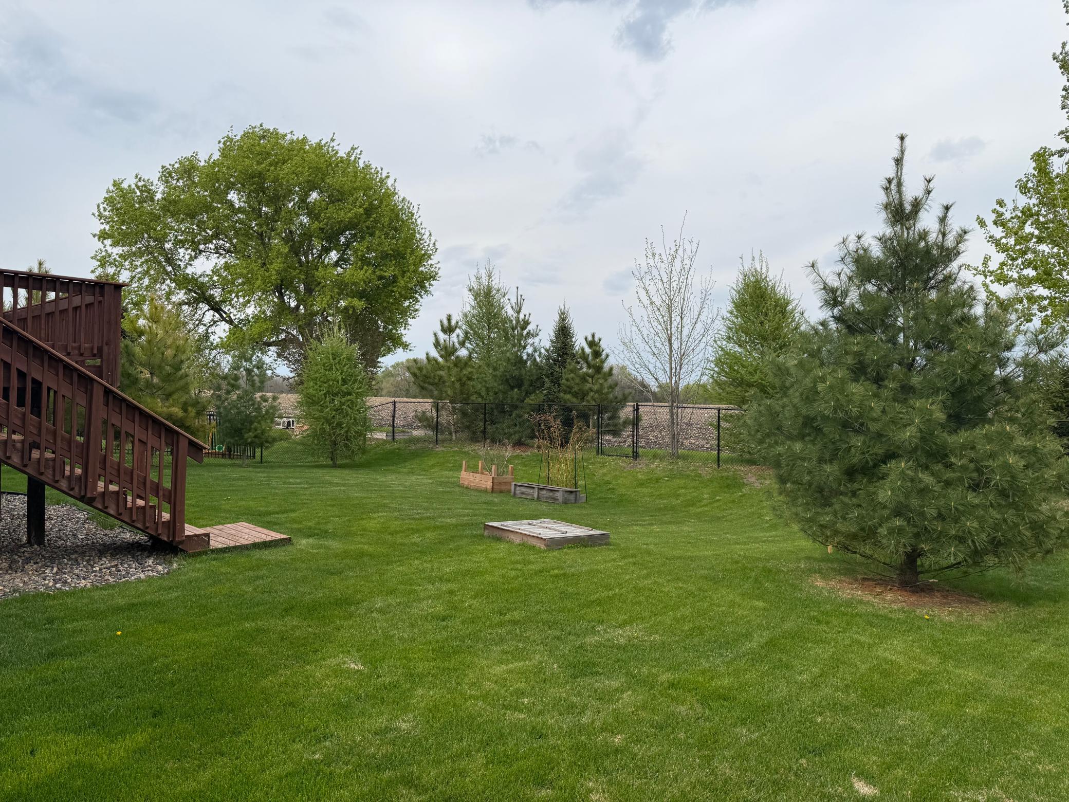 The backyard is fully fenced-in and offers a private and well-designed outdoor retreat. Positioned on a premium lot, this home offers rare backyard privacy, open views, and a peaceful setting with no direct rear neighbors.