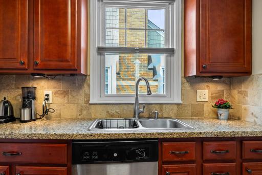 Rich cherry cabinets with under cabinet ligg