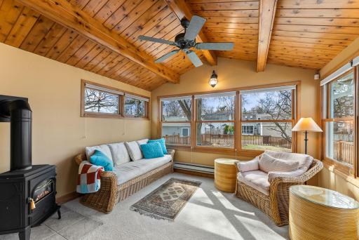 Enjoy the views from your 4-season porch warmed by gas fireplace