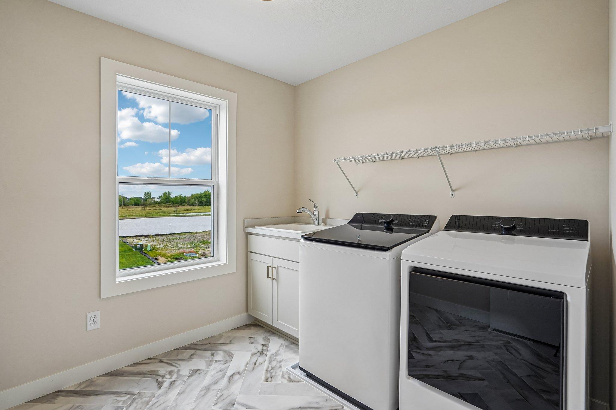 Laundry Room complete with sink and base cabinets