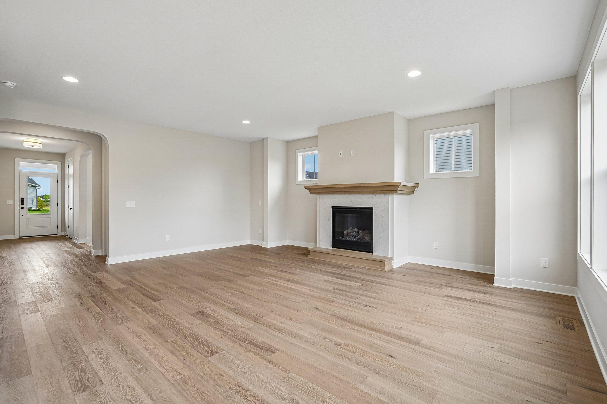 Just imagine - morning coffee to cozy movie nights gathered around this sleek fireplace.