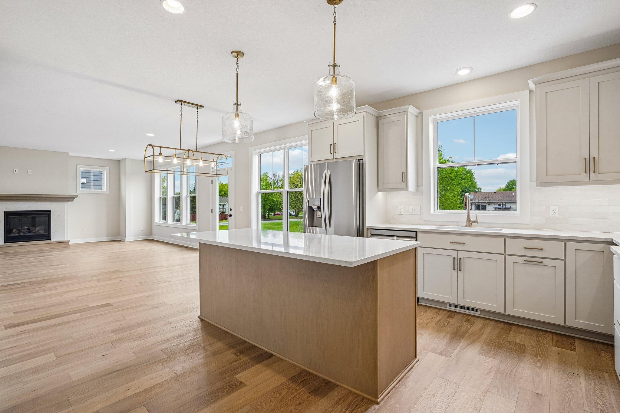 Custom cabinetry and upgrade LG appliances complete this stunning kitchen