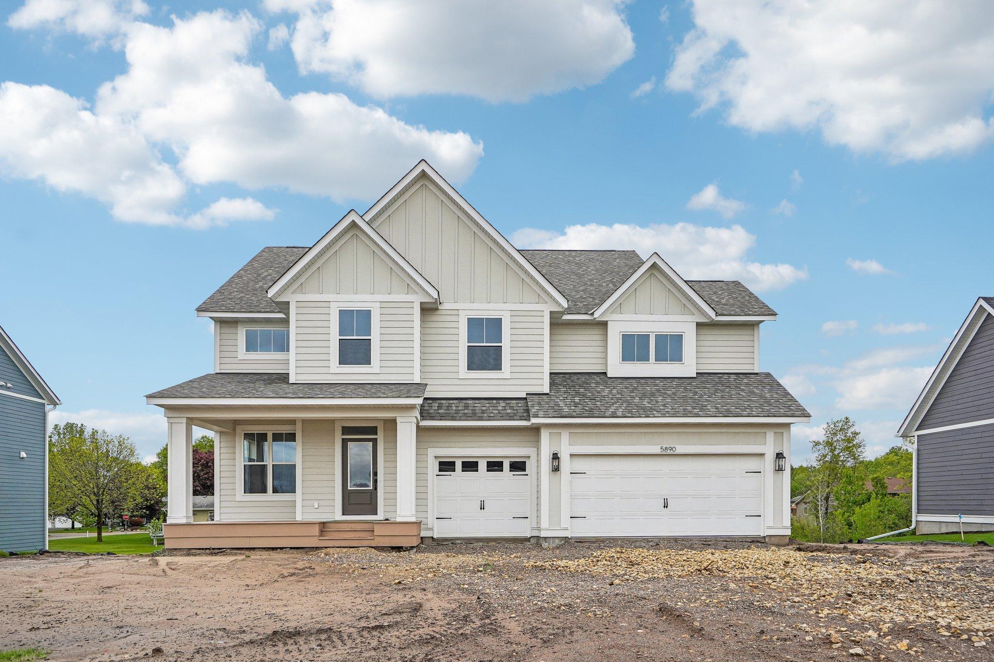 LP Smart Side Exterior with Board and Baton Accents - Driveway, Irrigation, Landscaping and Sod to all be in by mid June!