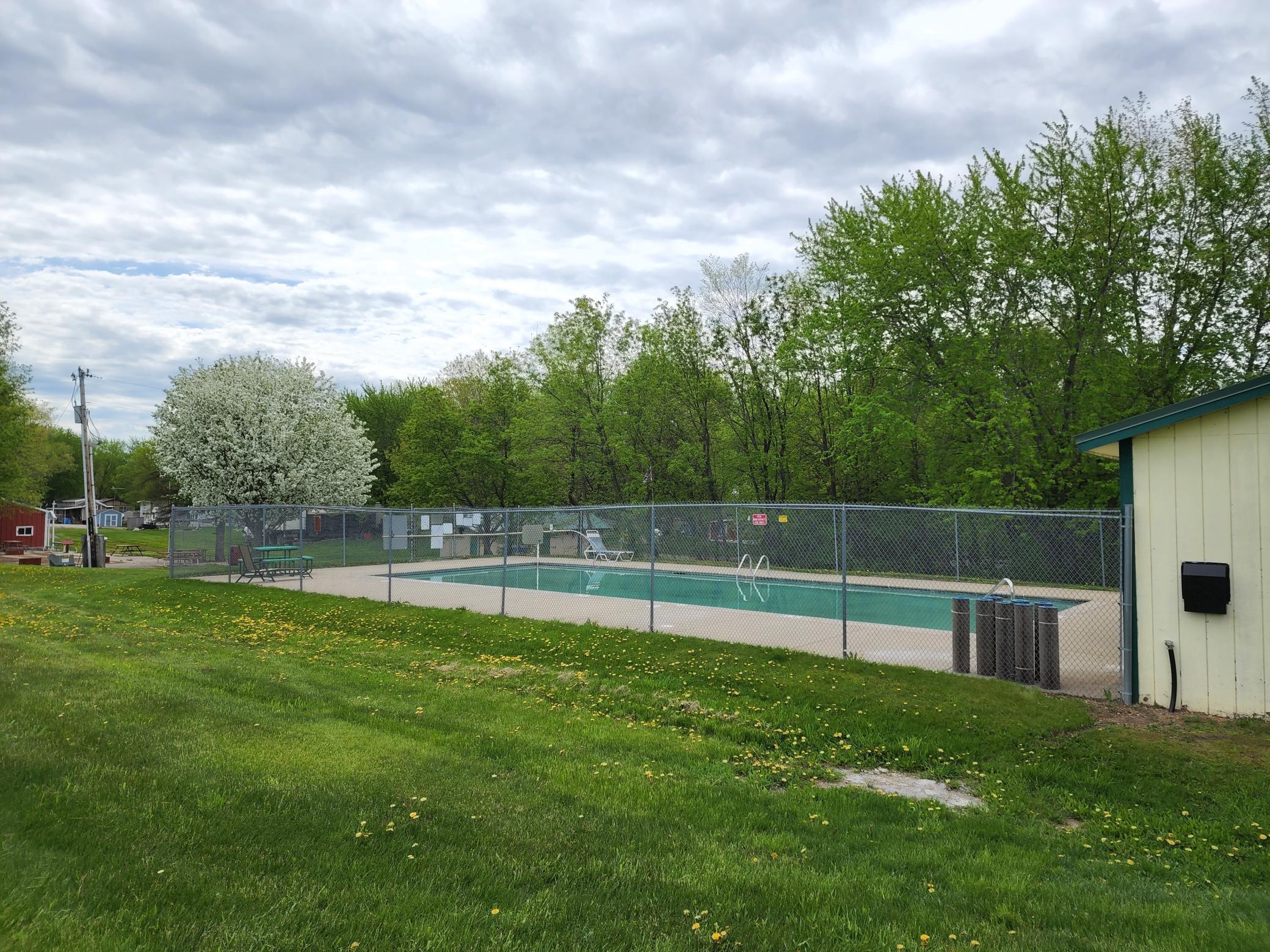 In-ground, heated swimming pool at Cokato Lake RV Resort. One of many amenities you will enjoy and not have further expense for besides typical membership assessments.